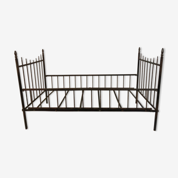 Wrought iron doll bed