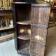 English corner cabinet in blackened wood, 19th century.