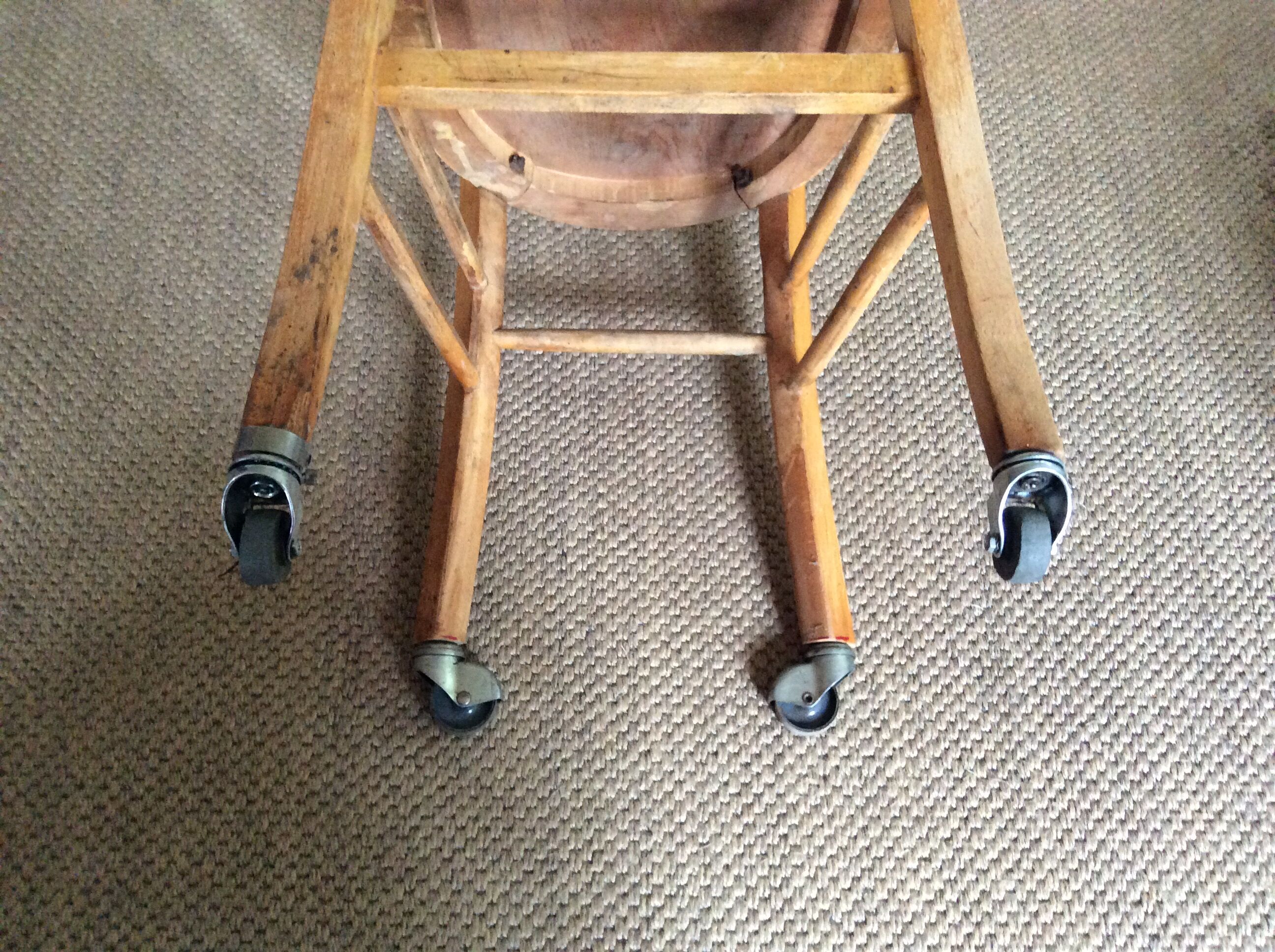 Wooden chair with wheels