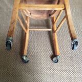 Wooden chair with wheels