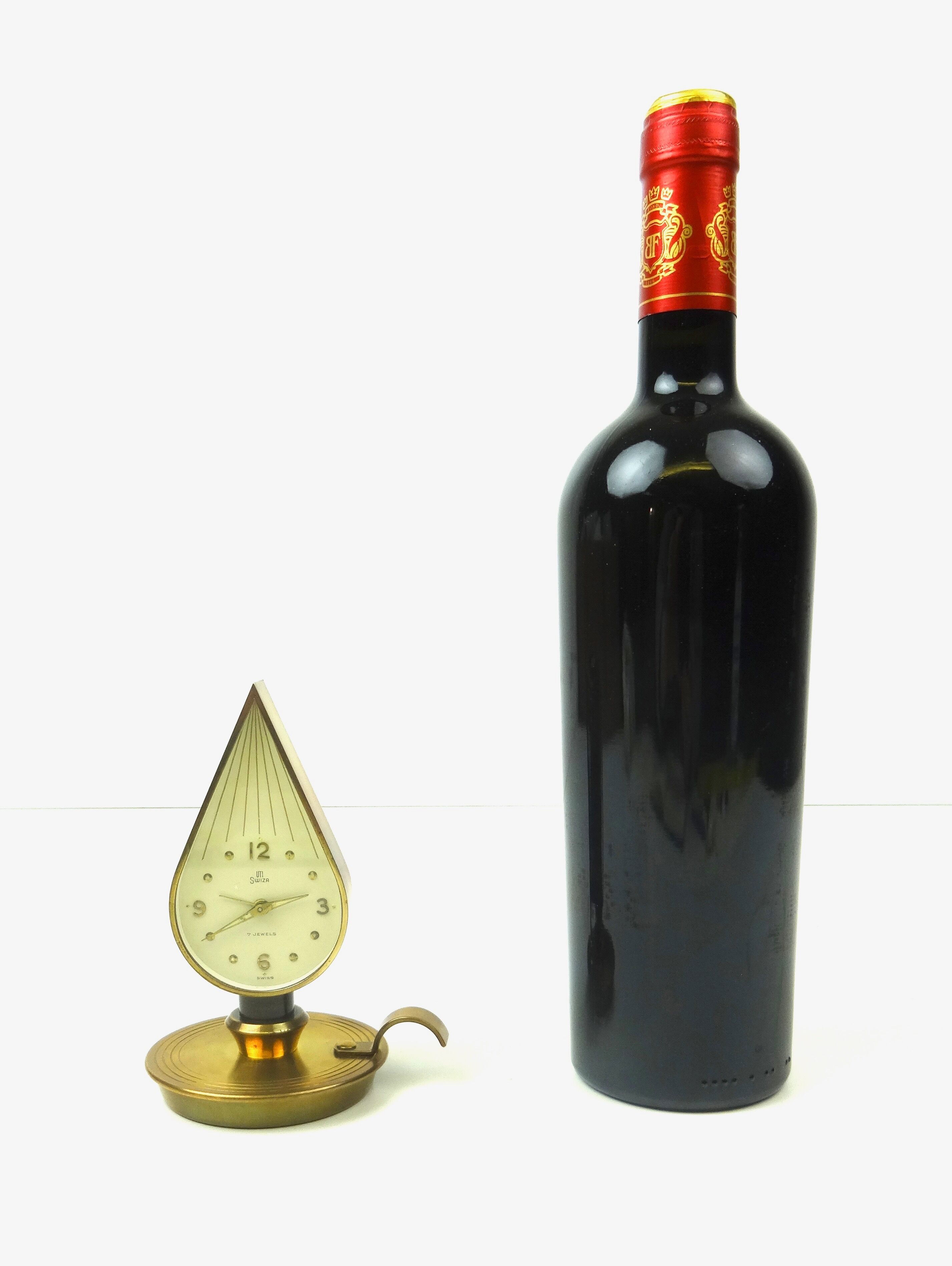 Lovely rare mid century Swiza brass candlelight shape desk clock Hollywood Regency Swiss 1950