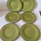 6 olive green plates with dotted relief, workshop ceramic style