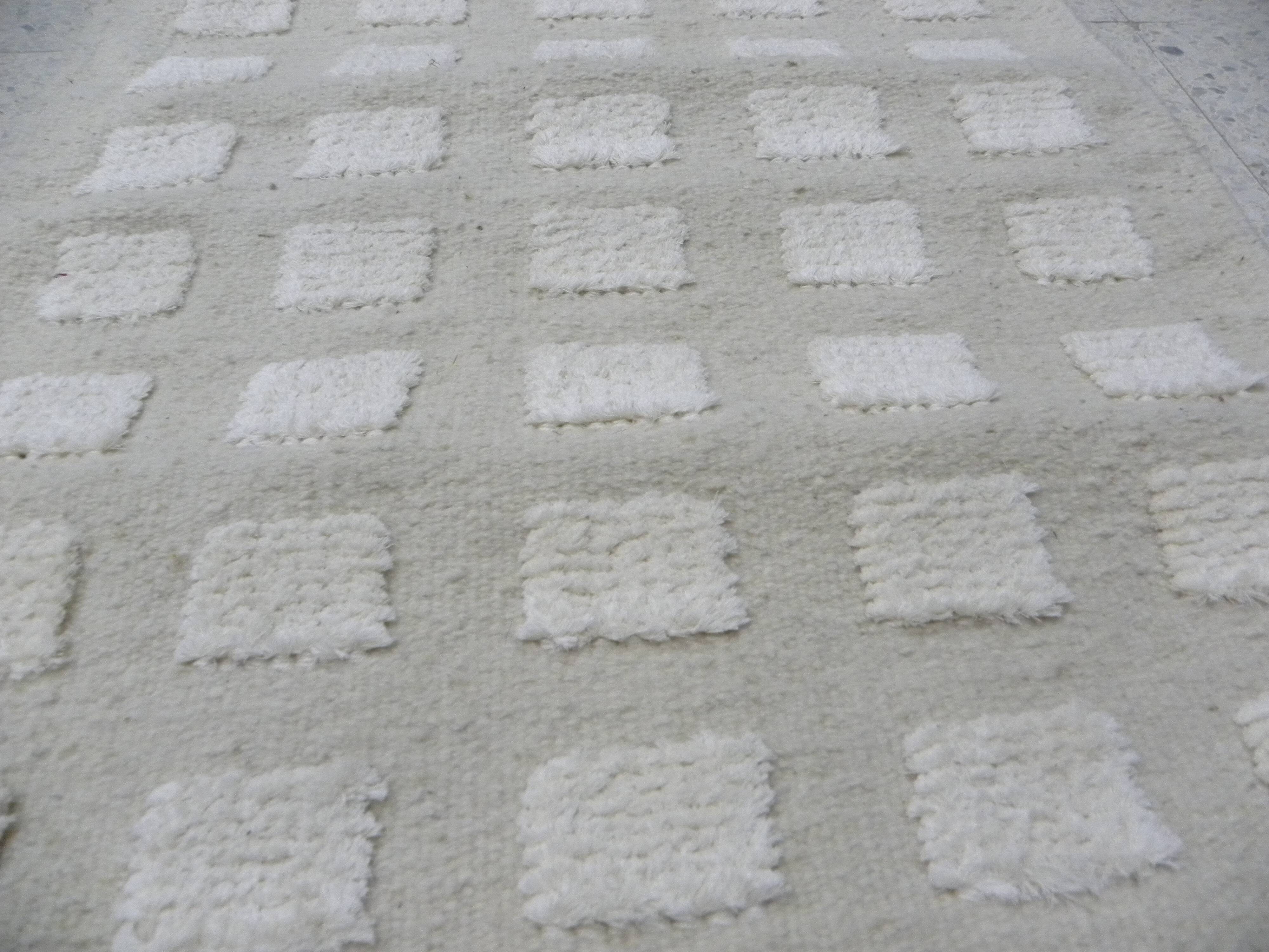 Tunisian Berber rug handwoven from pure sheep wool.