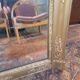Antique gilded mirror from the 19th century, mercury mirror.