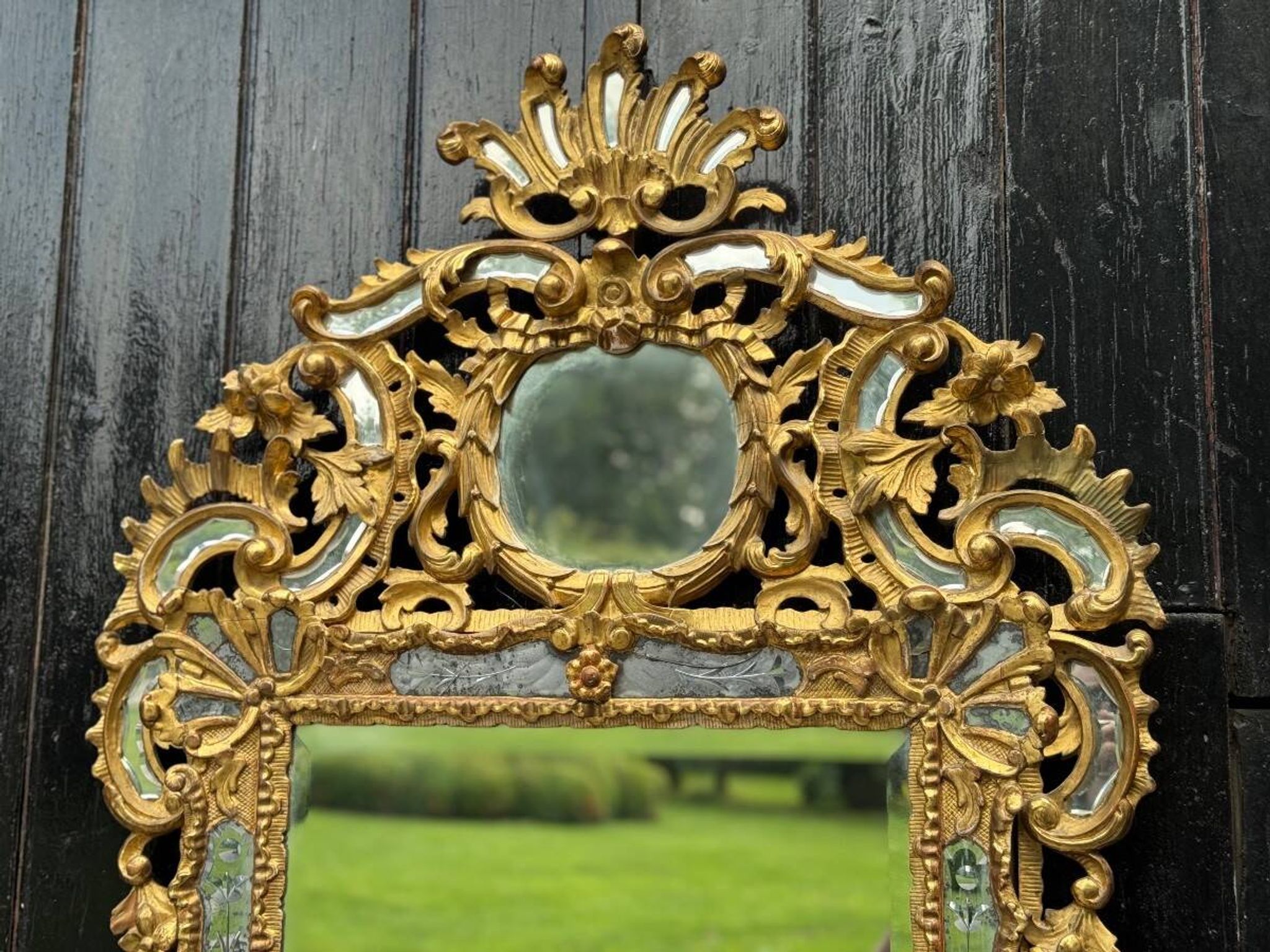Louis XV style mirror with parecloses in gilded wood, early 19th century, Empire A