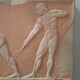 Bas-relief in the antique style featuring athletes.