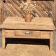 Large square farmhouse coffee table made of raw solid oak.
