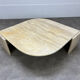 Table basse travertin forme œil par Roche Bobois