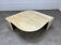 Table basse travertin forme œil par Roche Bobois