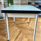 Water-green extendable Formica table