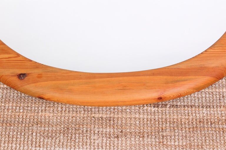 Mid-century oval mirror in solid pine Sweden 1960s 120x95cm