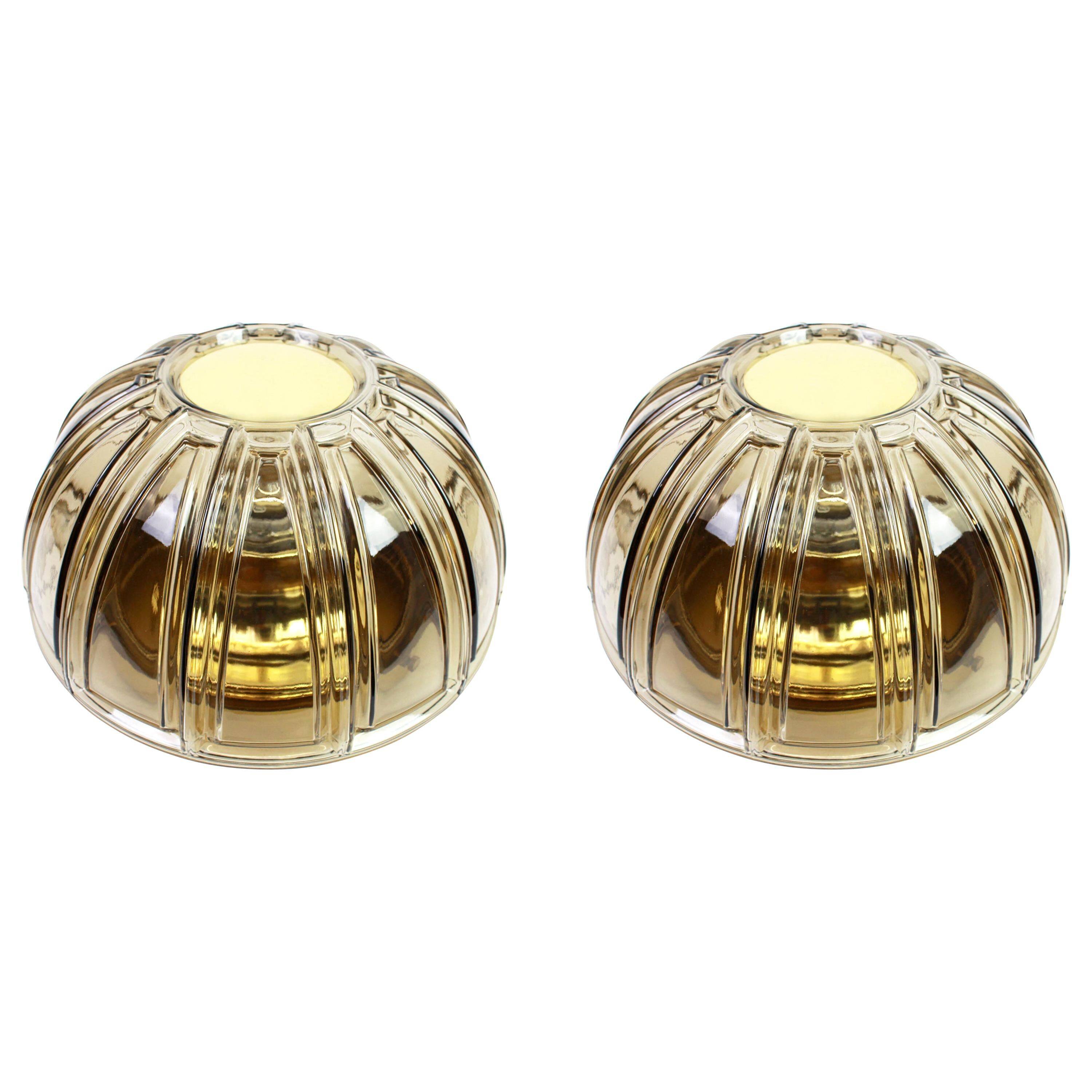 Pair of wall sconces or ceiling lights in brass and amber glass by Limburg, Germany, 1960s.