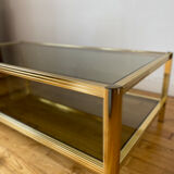 Gold metal coffee table and smoked glass