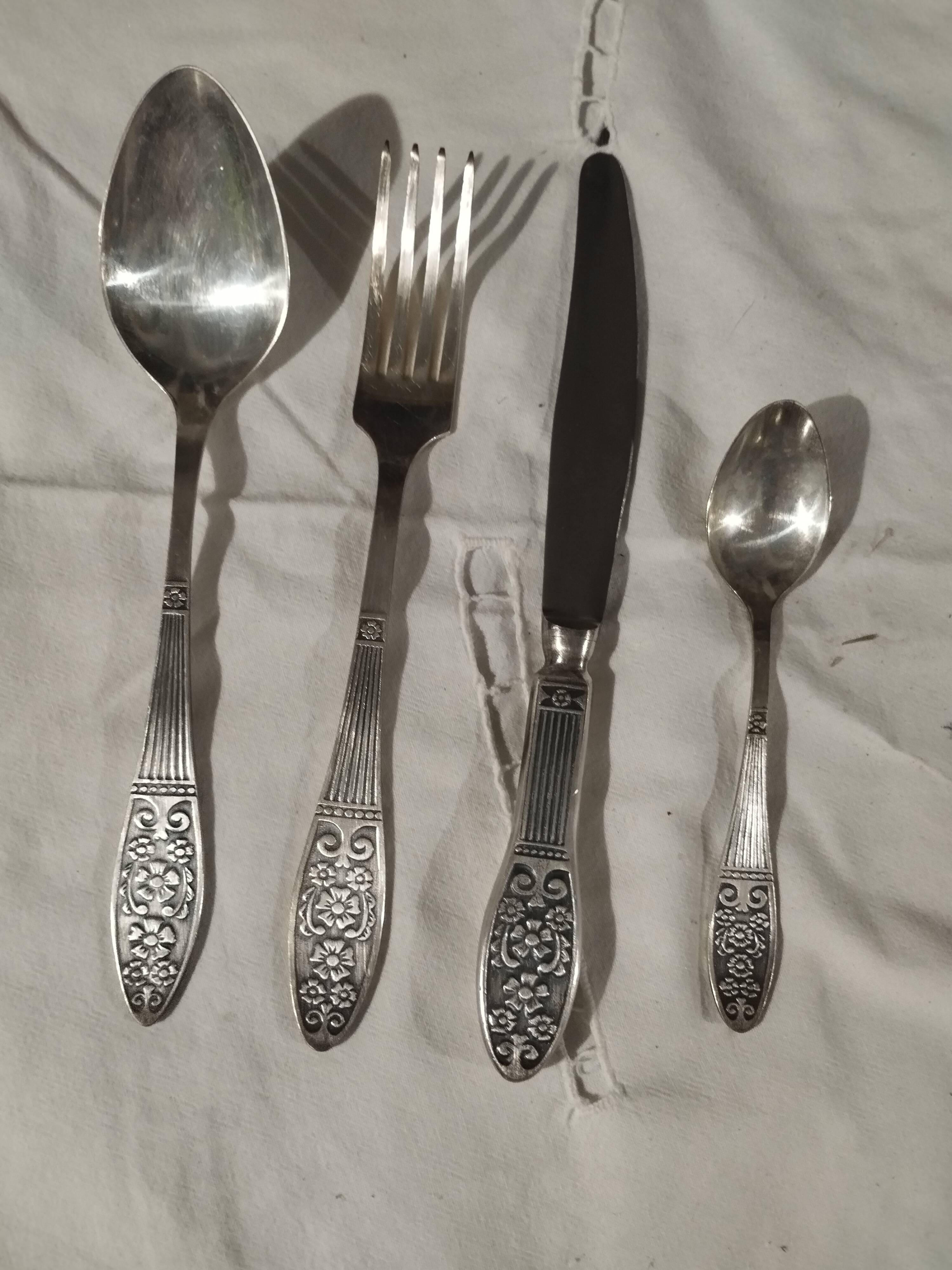 Silver metal cutlery