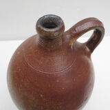 ancient water jug in vitrified sandstone, bulging avc handle
