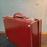 Red leather suitcase
