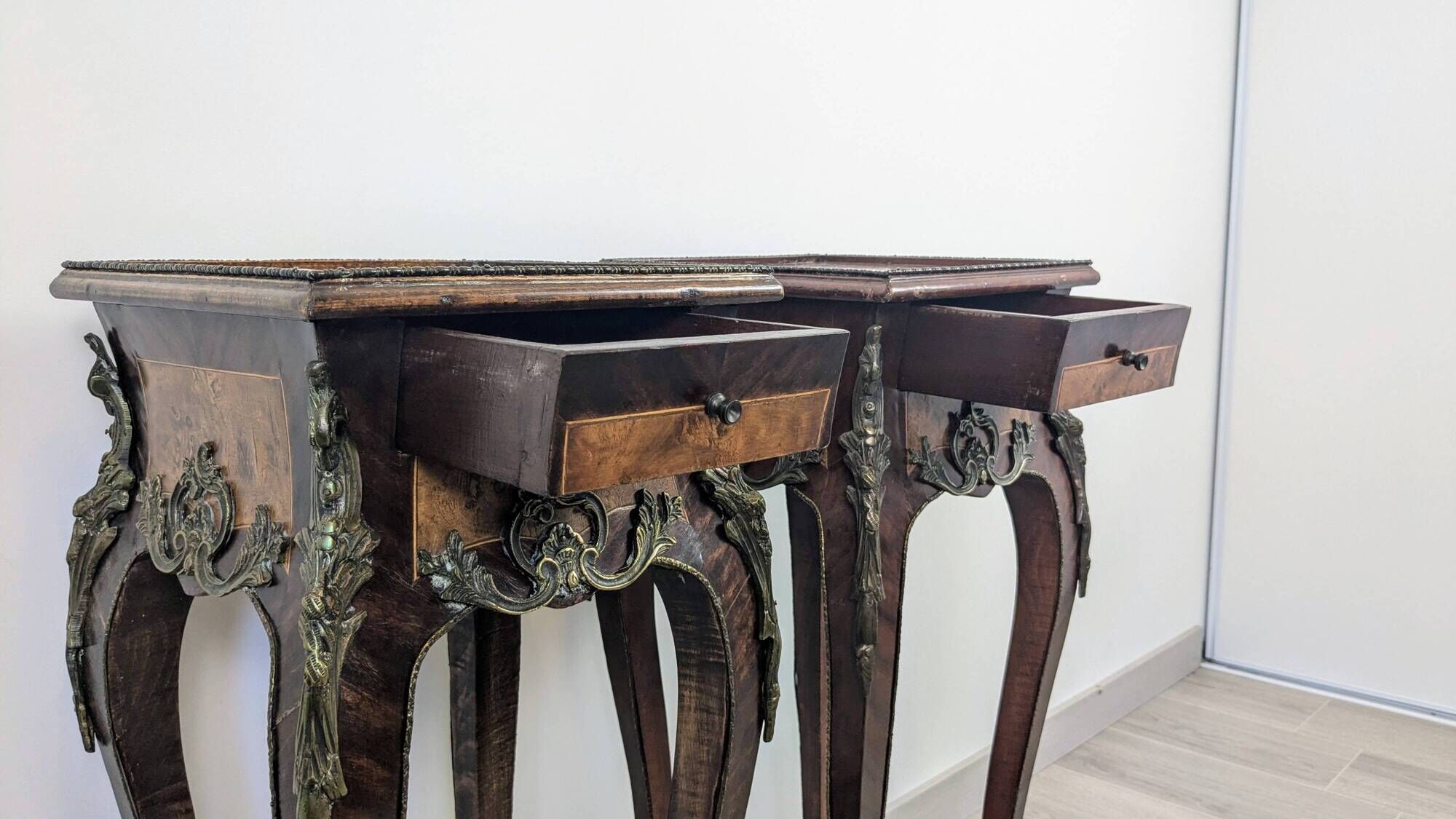 Pair of Louis XV bedside tables with marquetry and gilded bronzes