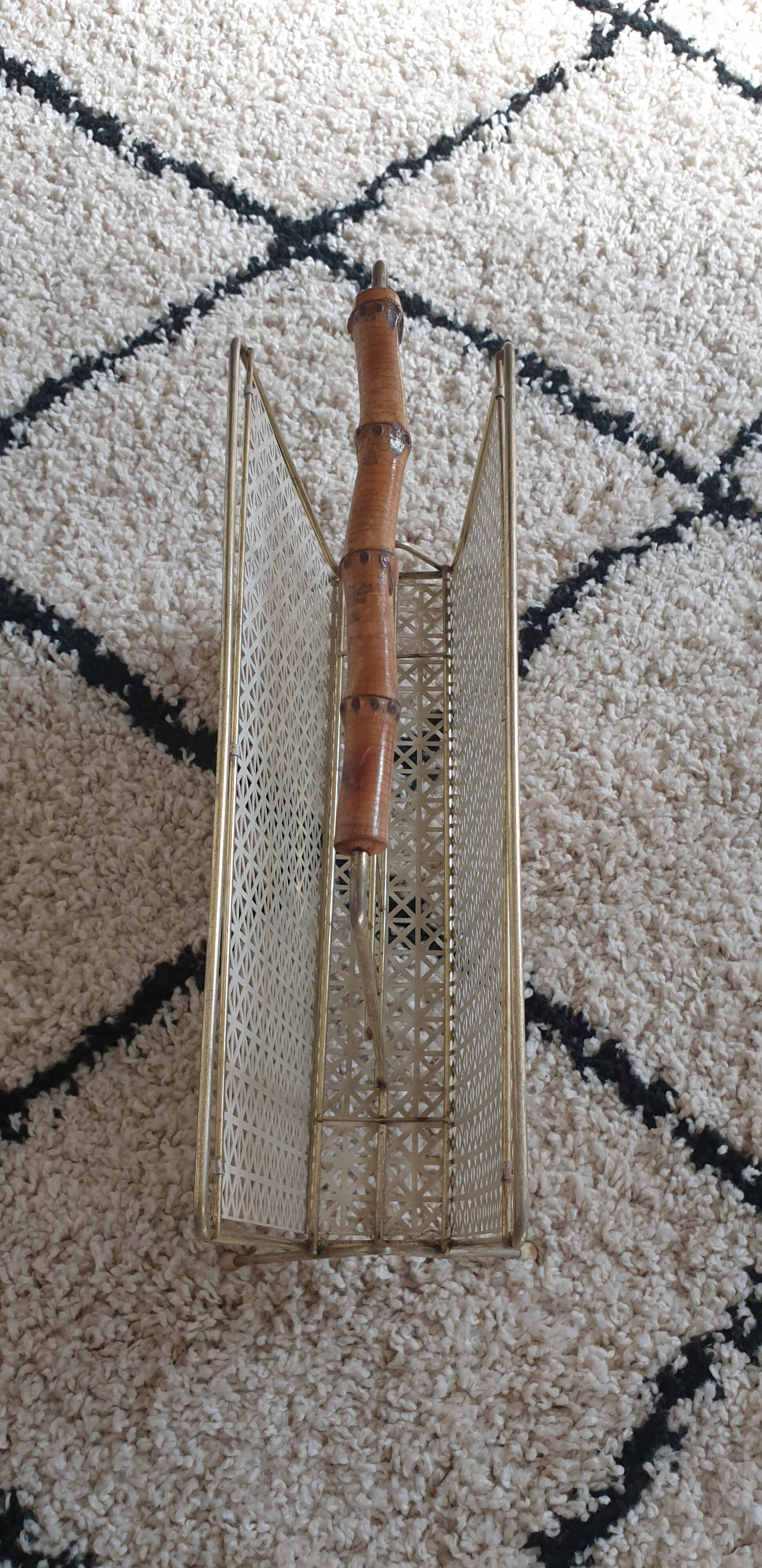 Perforated metal review door