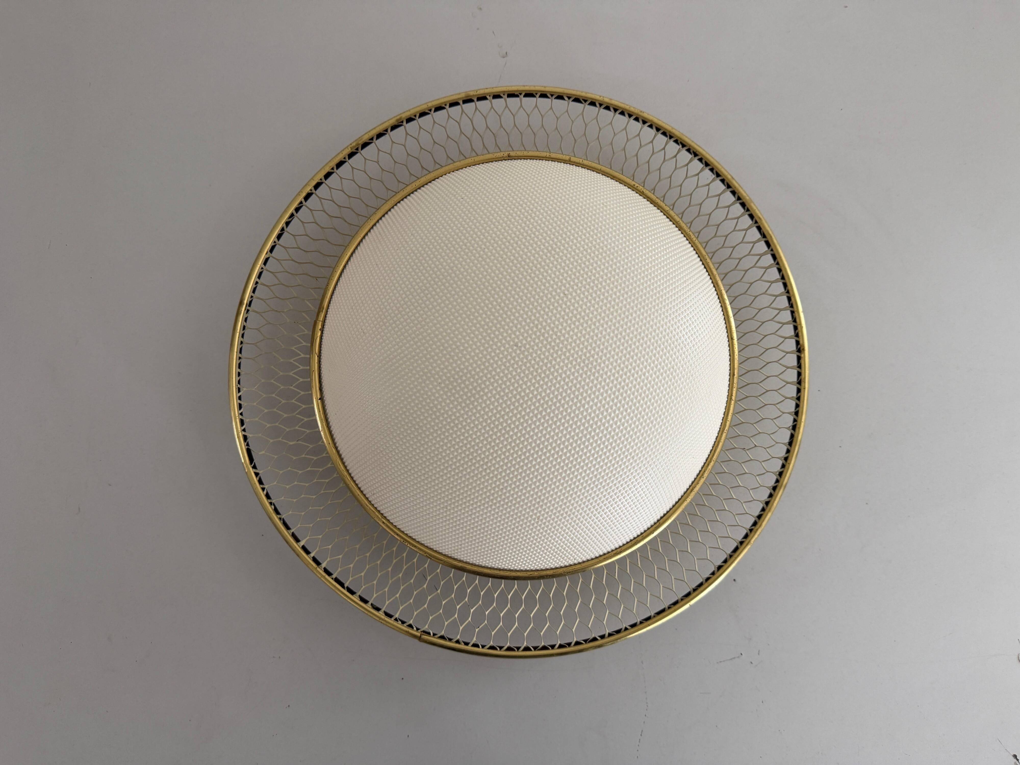 Mid-century golden metal wire and plastic ceiling light by Erco, 1950s, Germany.
