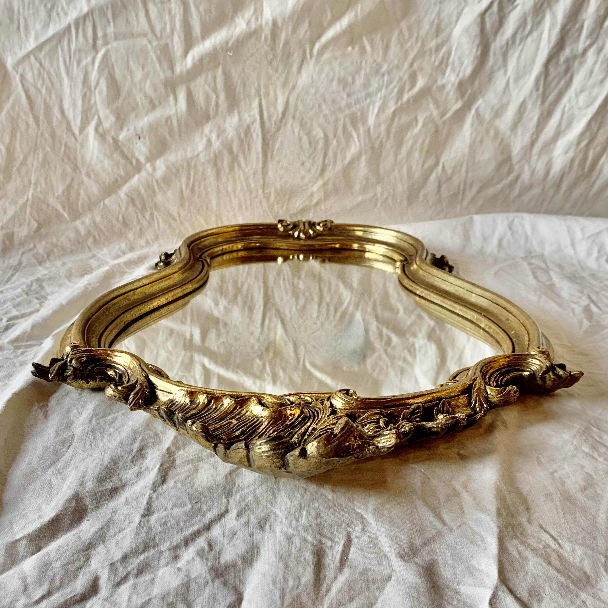 Old wall mirror in golden resin rococo style - made in france