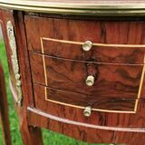 half-moon bedside pair in marquetry, bronze ornaments
