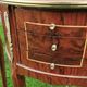 half-moon bedside pair in marquetry, bronze ornaments