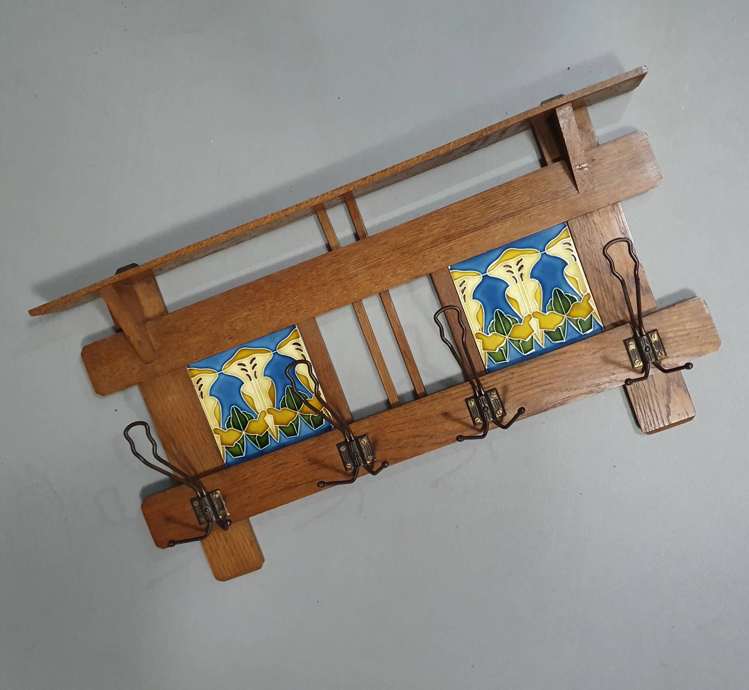 Art Nouveau wall coat rack with tiles