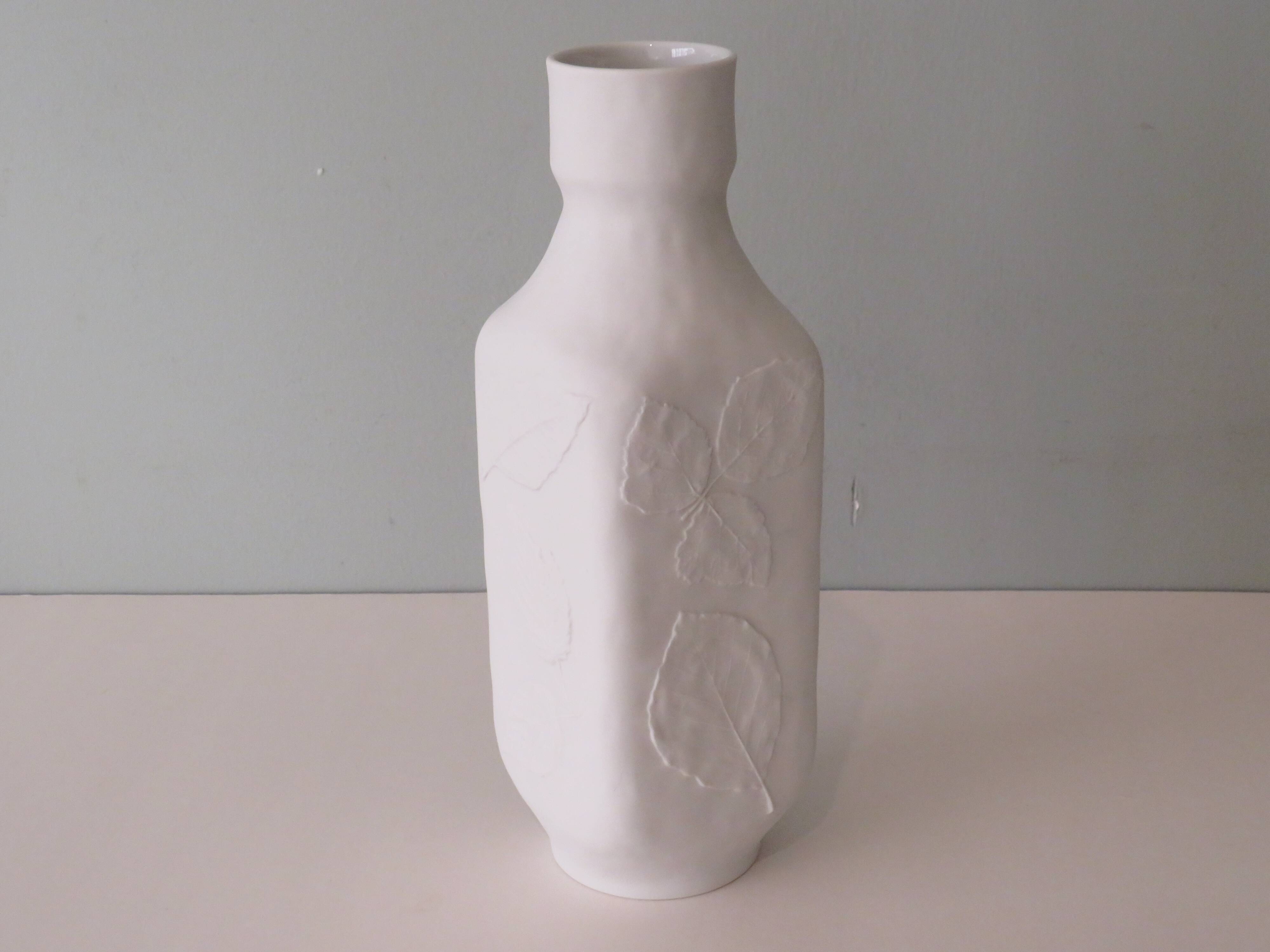 White biscuit vase with floral motif in relief, Hutschenreuther, Germany 1970