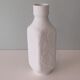 White biscuit vase with floral motif in relief, Hutschenreuther, Germany 1970