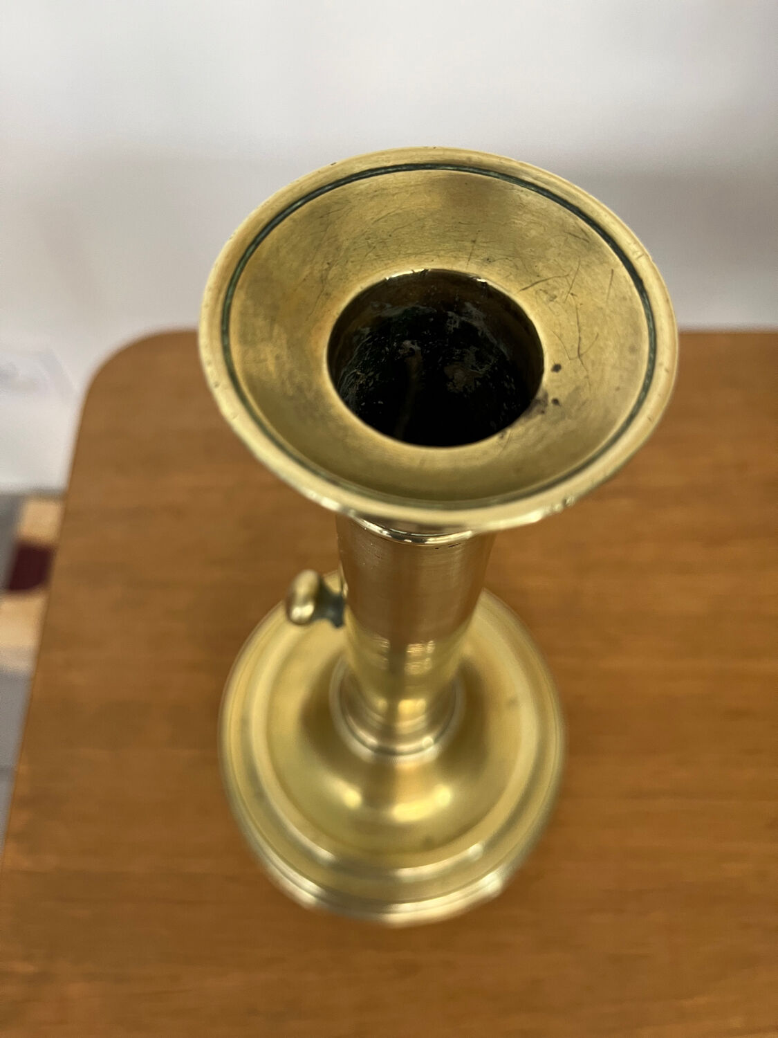 Antique brass push candle holder