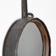 Wrought iron mirror by Léopold Gest, France, circa 1970.
