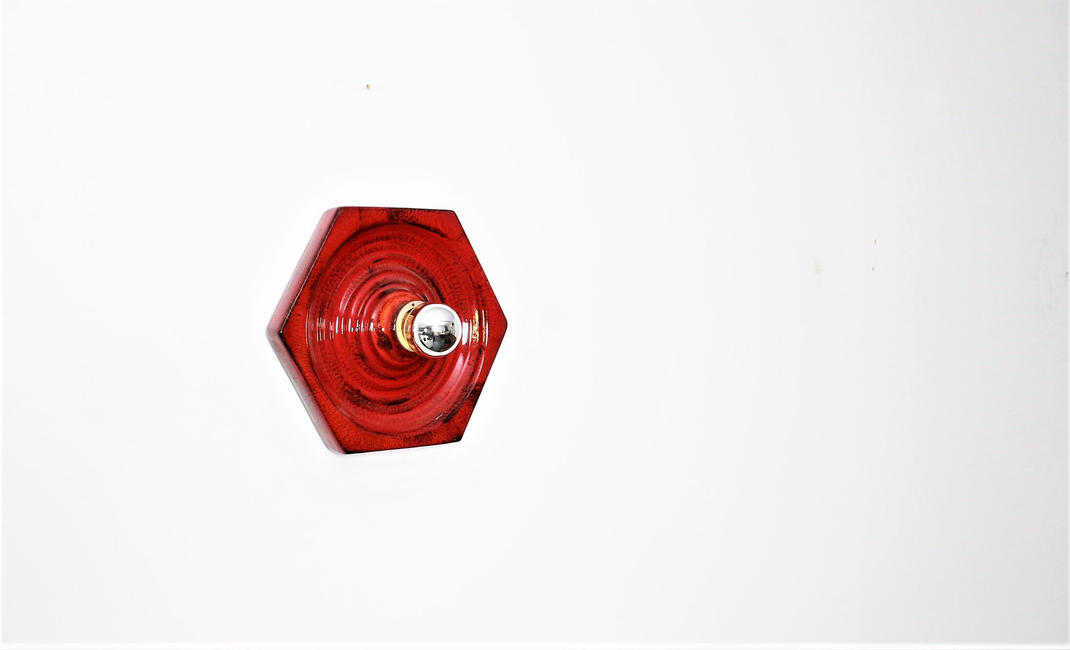 Wall sconce by Hustadt in shiny red