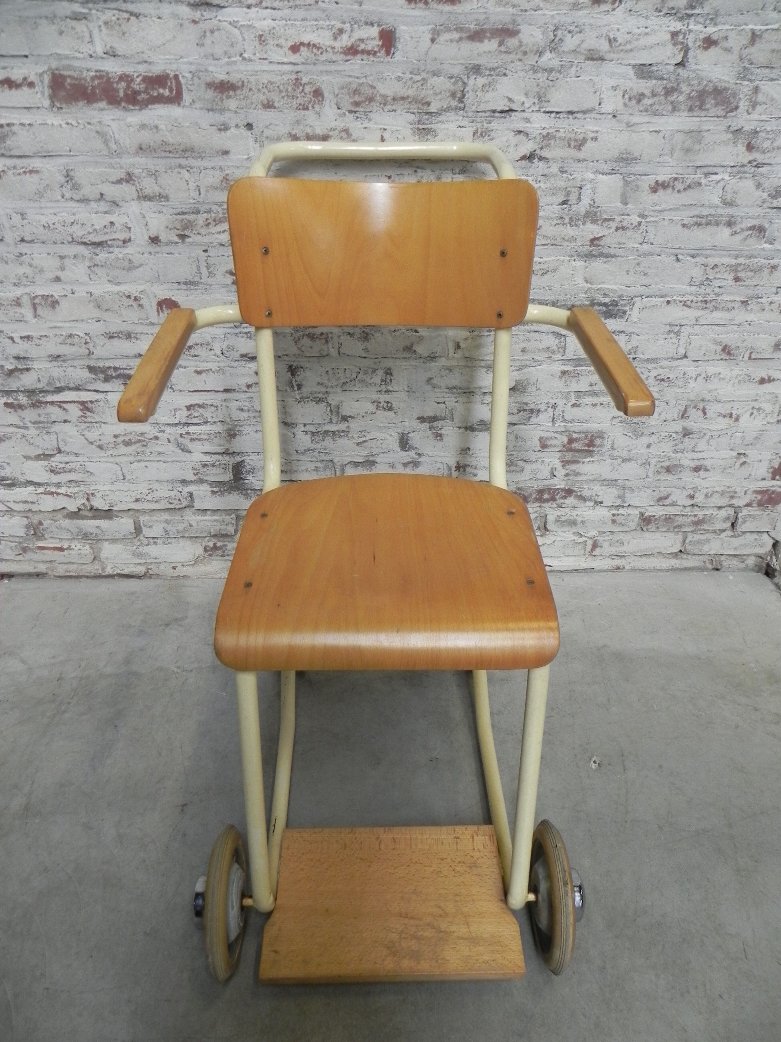 Vintage chair on wheels, wheelchair