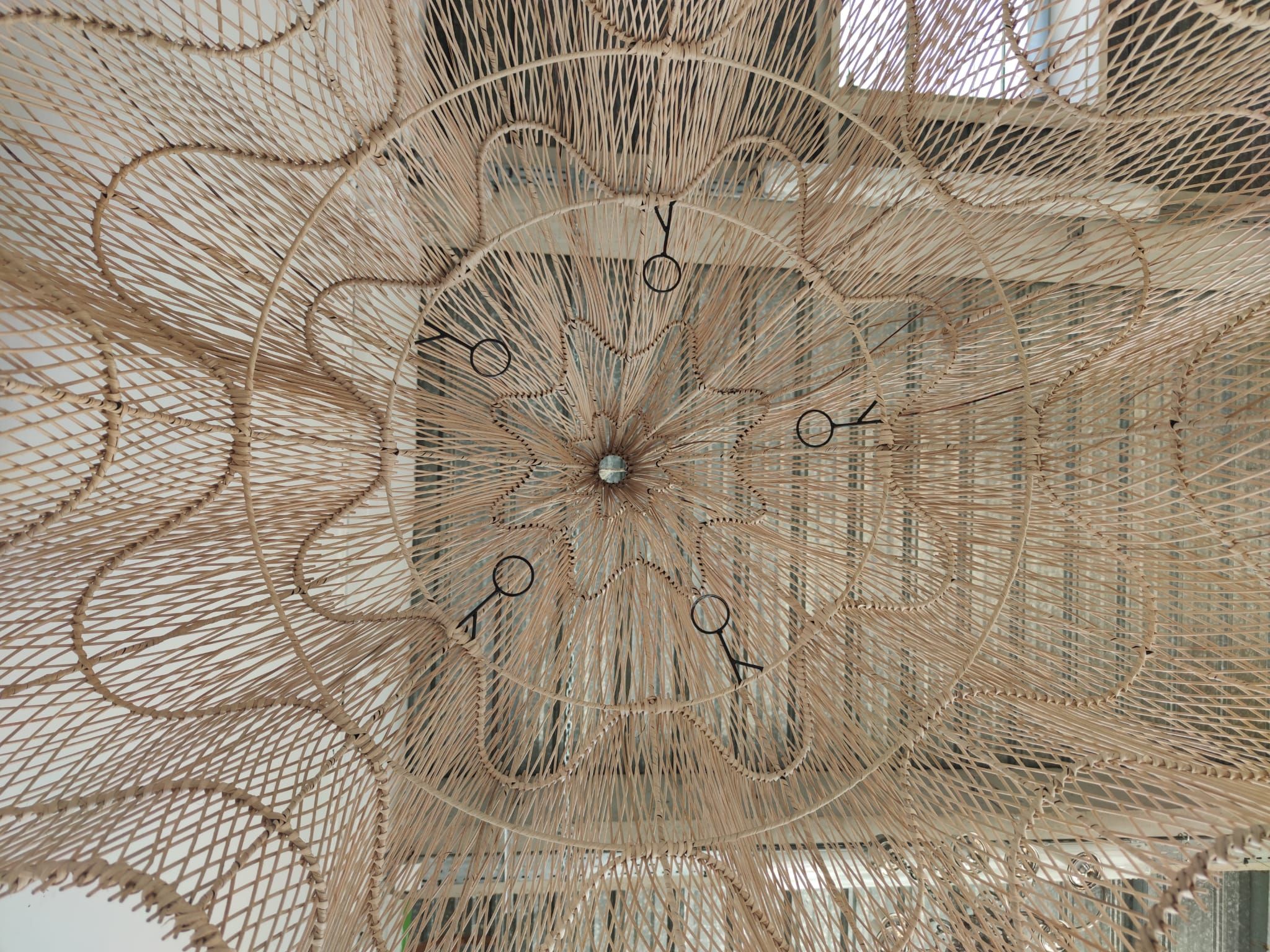 Huge rattan suspension in the shape of a corolla H:1m; D: 1m50
