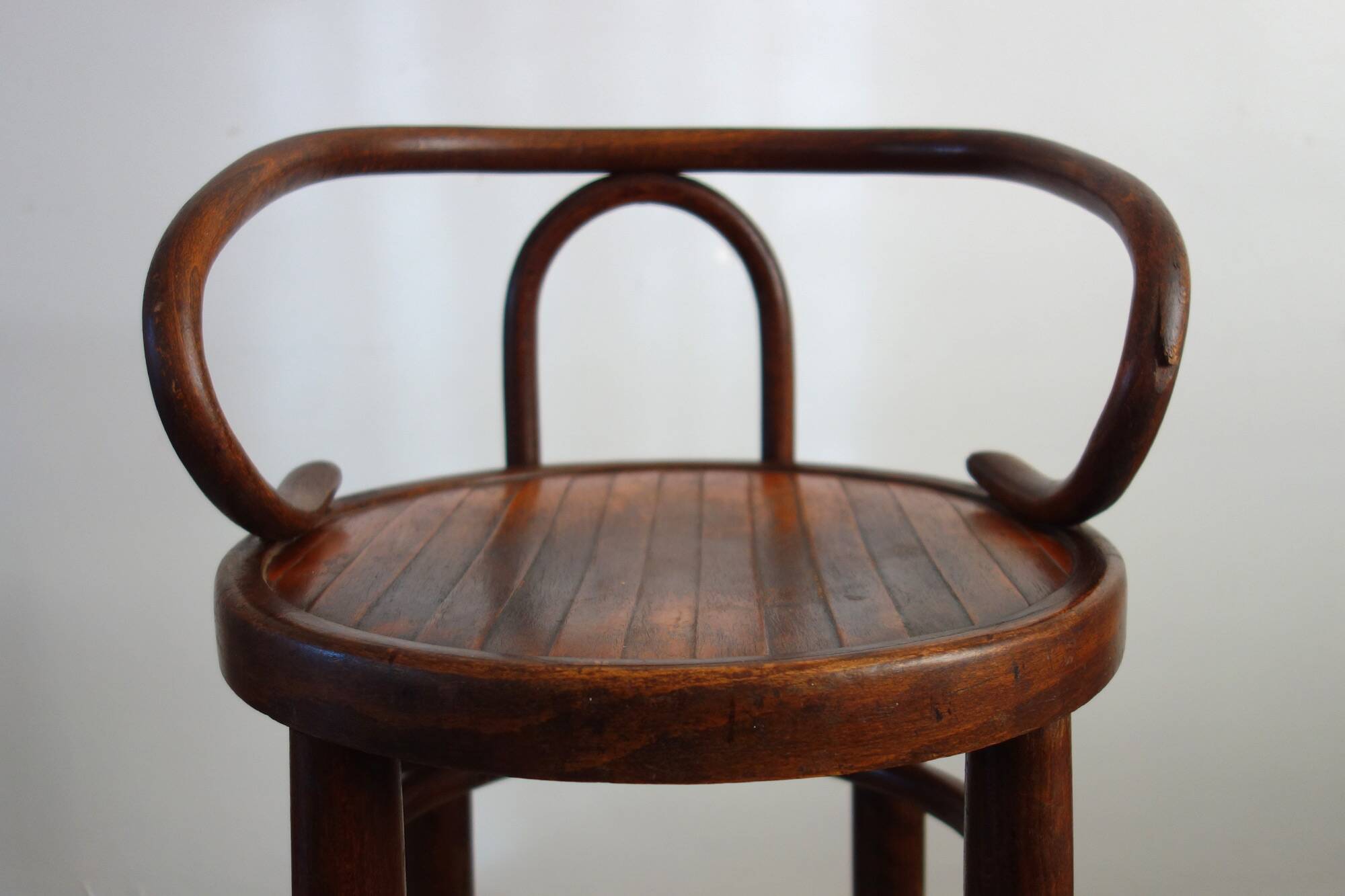 Children's high stool in curved wood, 1890s