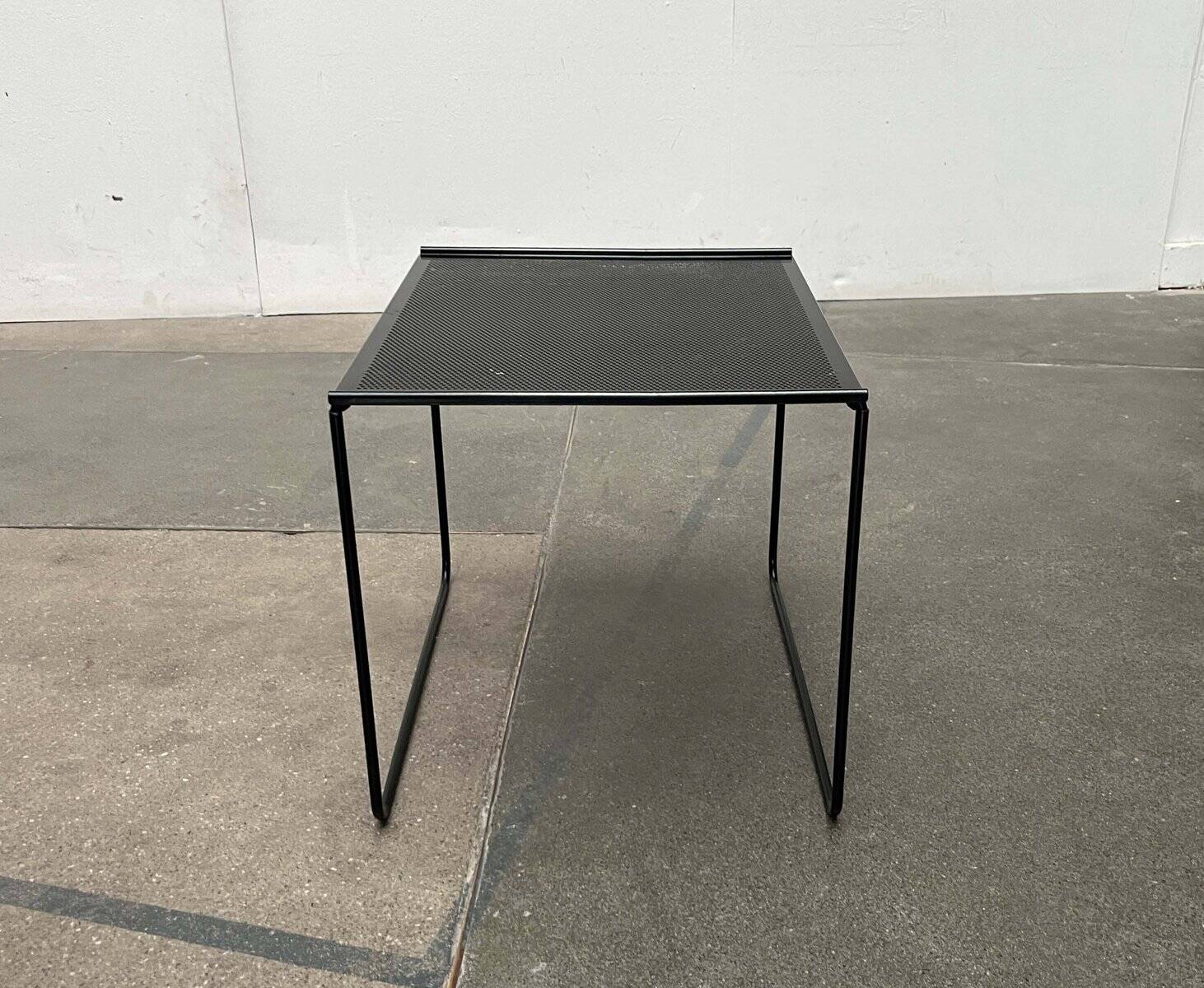 Postmodern perforated metal nesting side table from Ikea, 1980s.