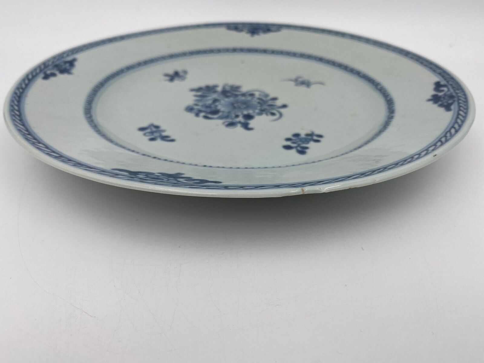 Plate in porcelain blue and white china xviii floral decoration