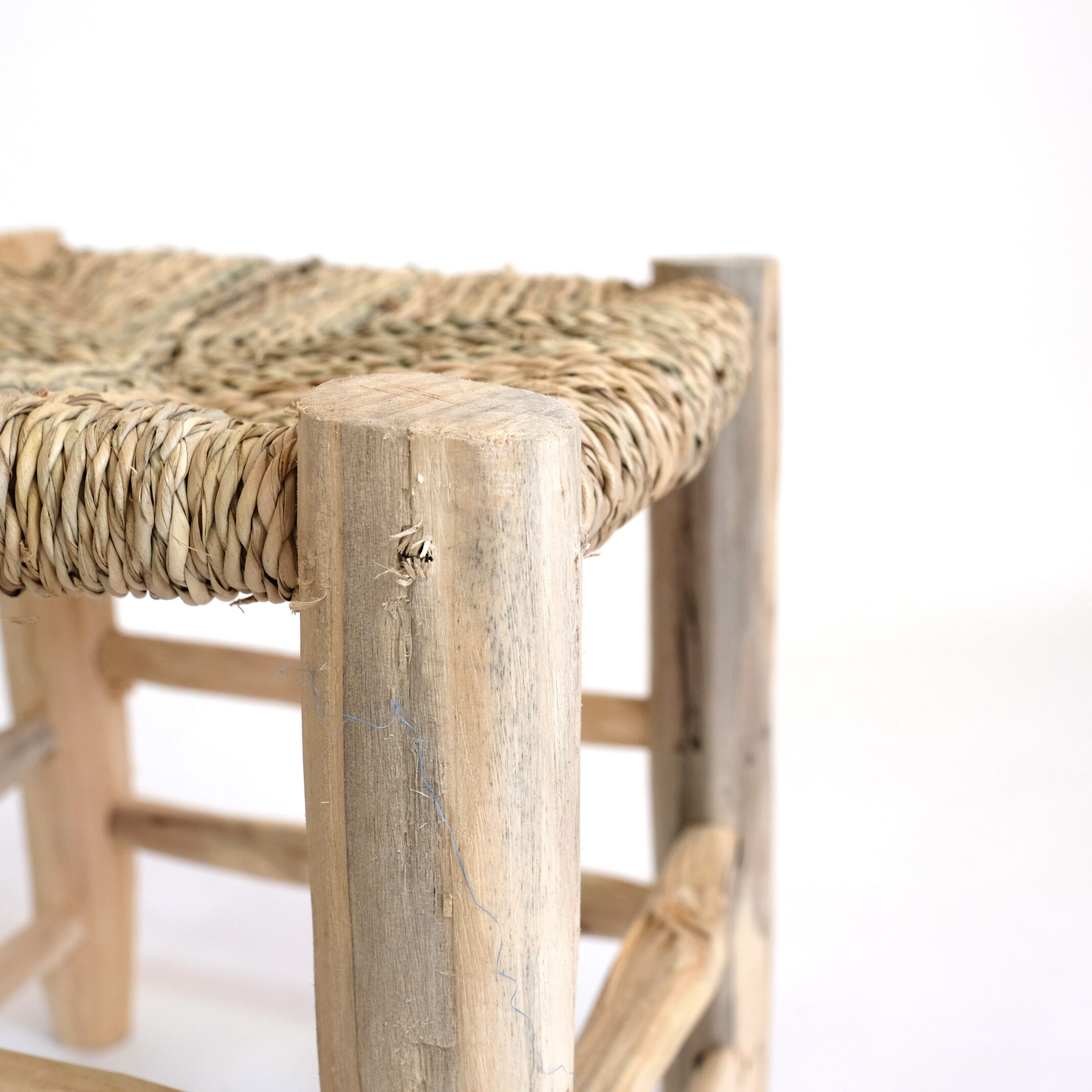 Minimalist stool made of wood and rope