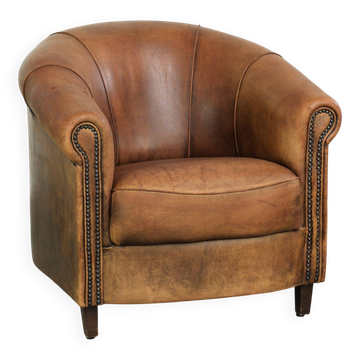 Vintage sheepskin clubchair in a beautiful cognac colour with a sturdy look