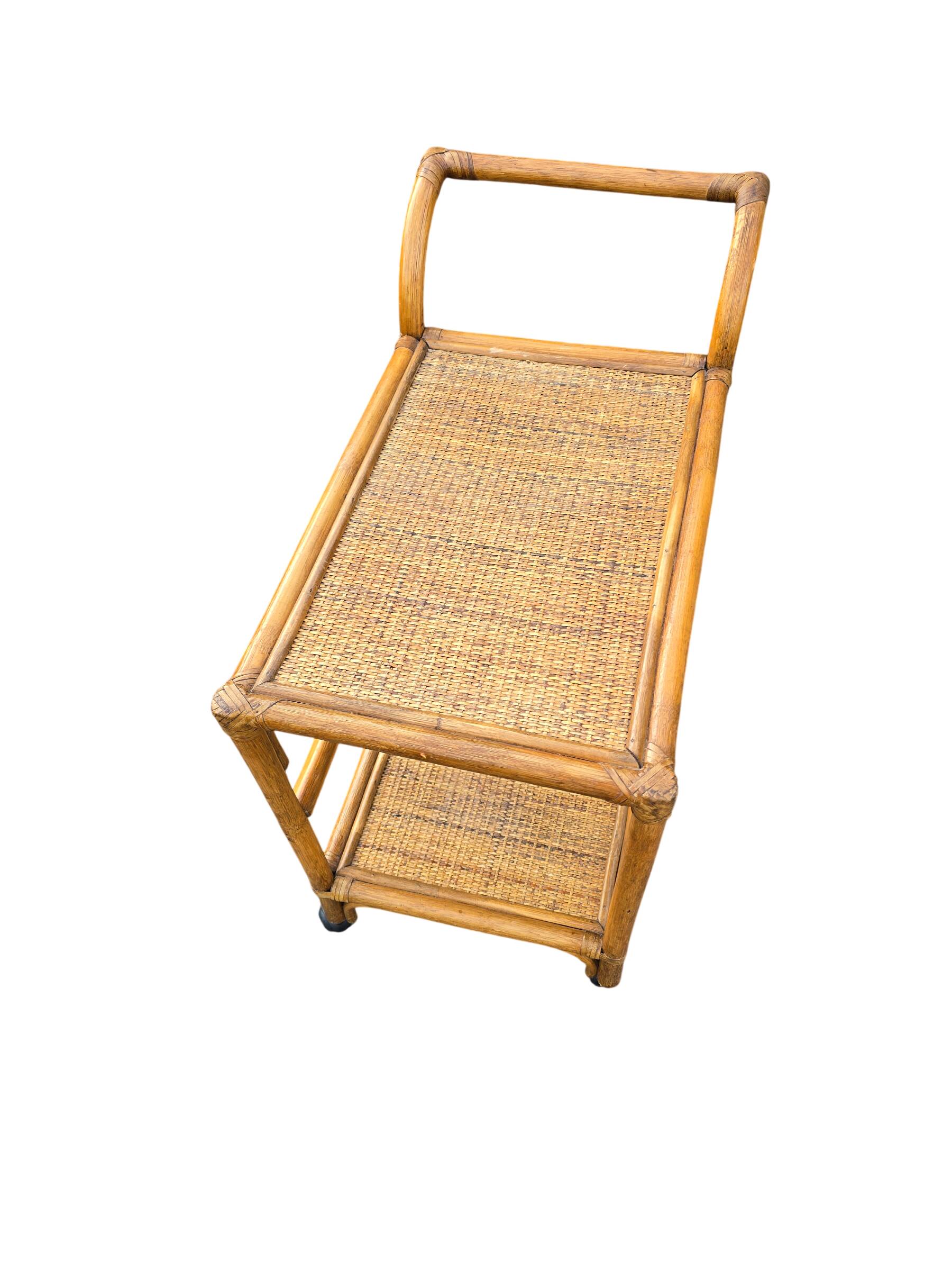 Vintage rolling dessert trolley in rattan and cane from the 60s/70s.