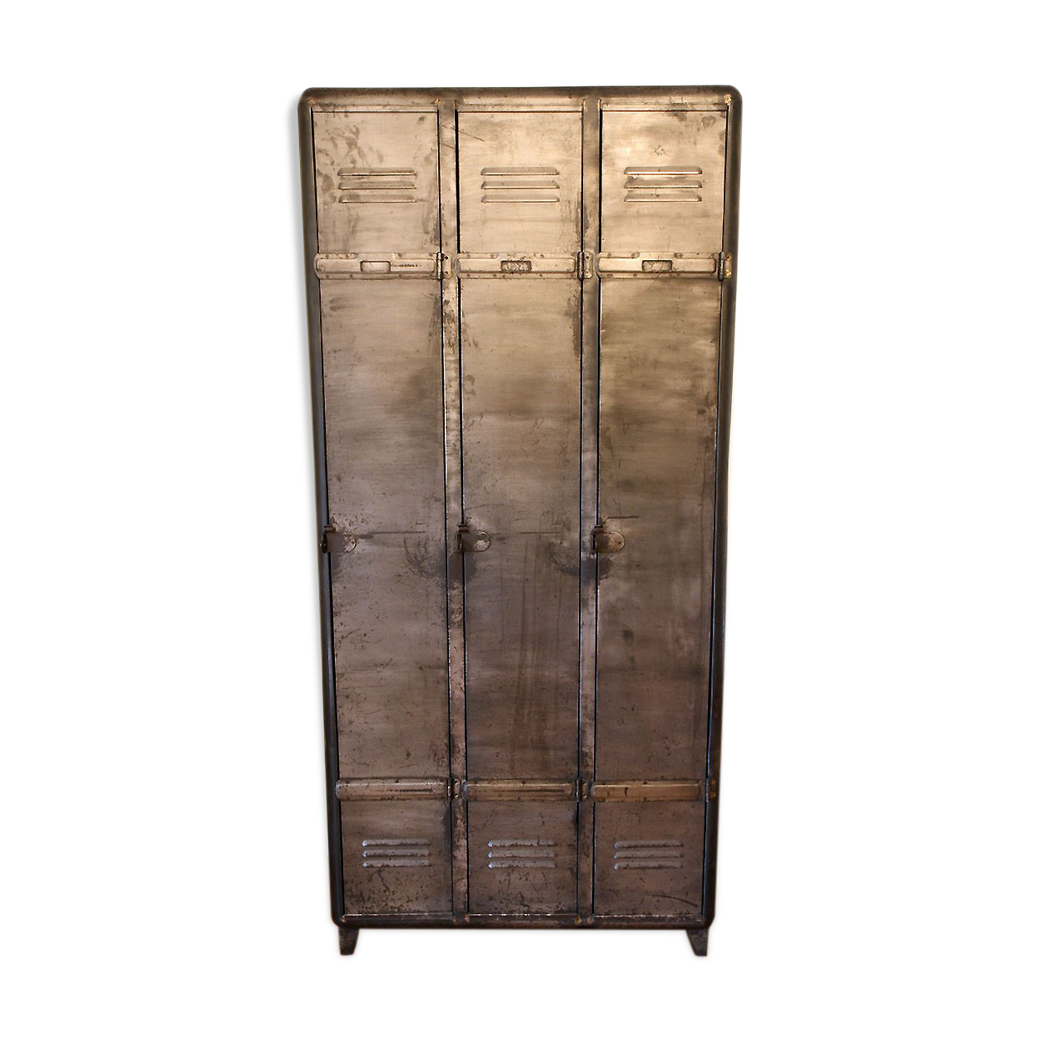 Industrial metal cloakroom with rounded corners.