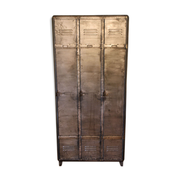 Industrial metal cloakroom with rounded corners.