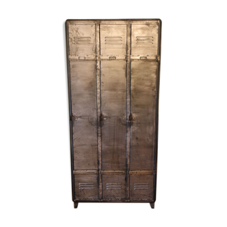 Industrial metal cloakroom with rounded corners.