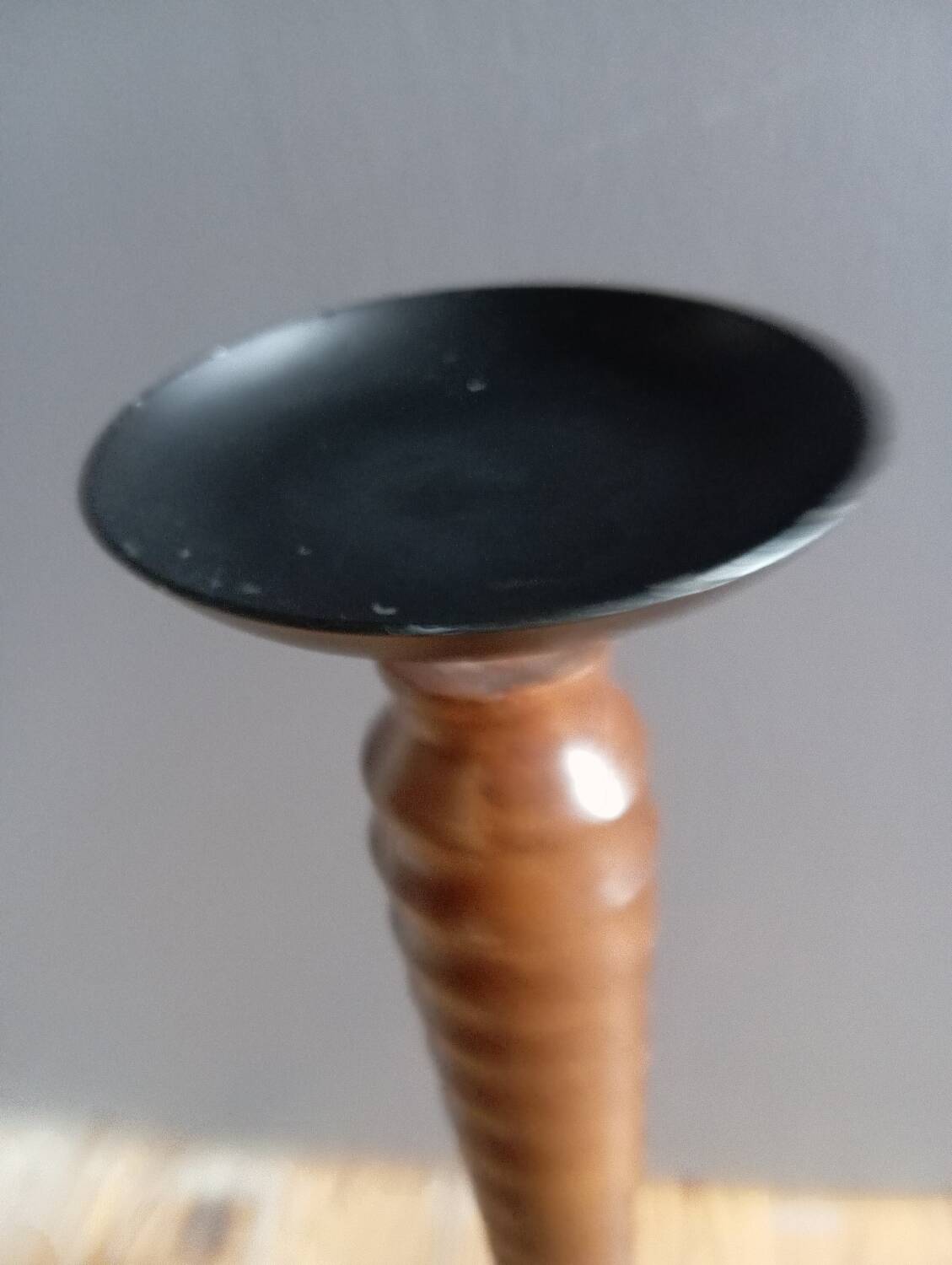 Vintage turned wooden candle holder, black metal candle base
