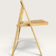 Blonde wooden folding chair in the style of Aldo Jacober.
