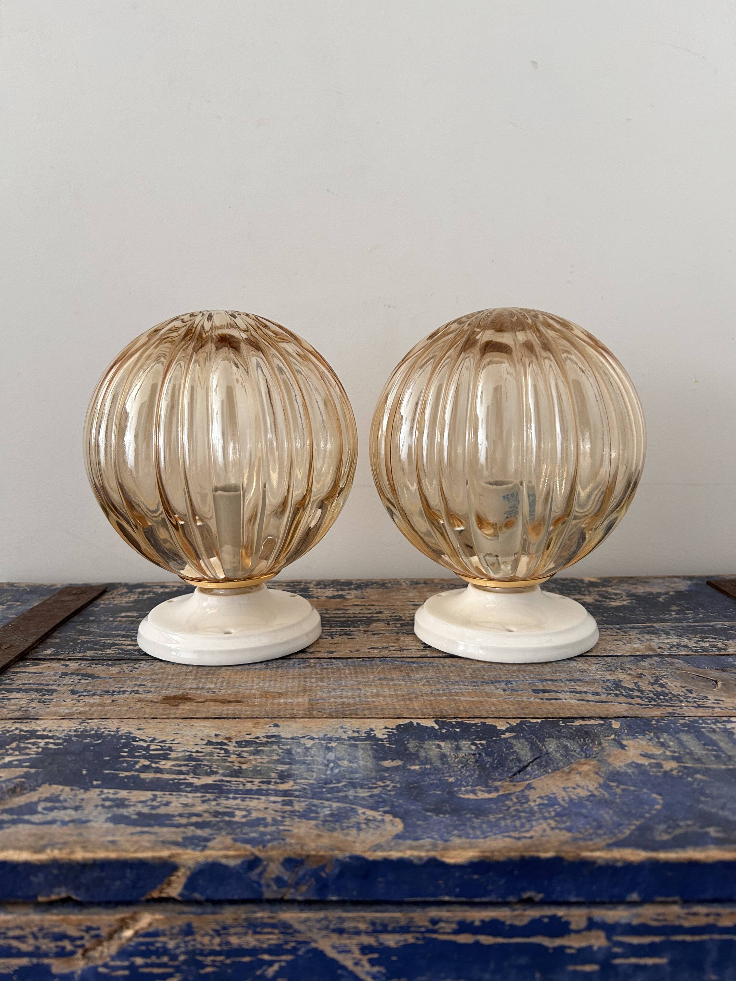 Pair of vintage golden globe wall or ceiling lights