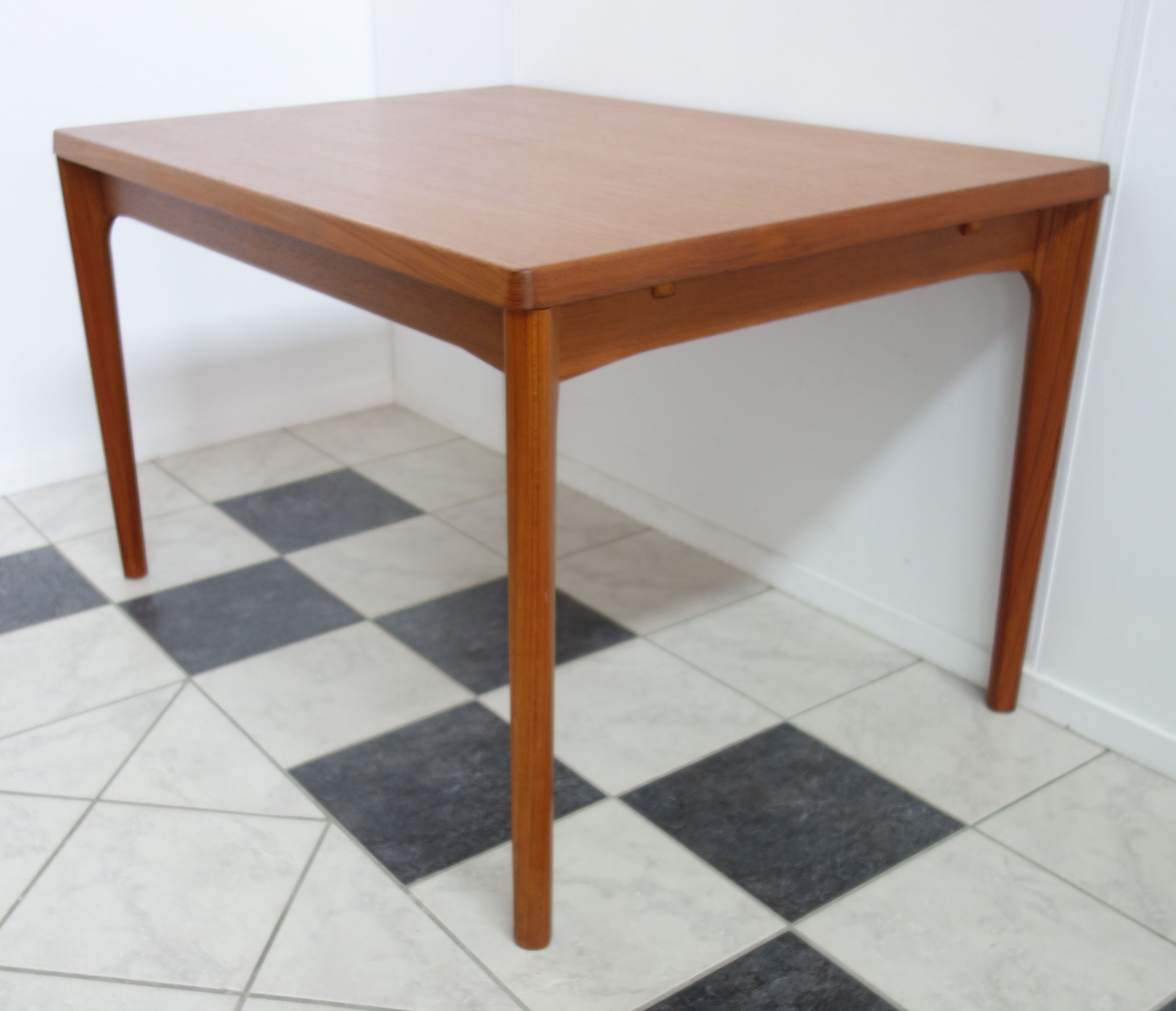 Danish teak dining table by Henning Kjaernulf 1960s