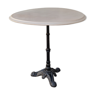 Round wooden bistro table