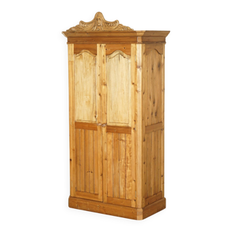 Vintage hand-carved wardrobe in Art Nouveau style.