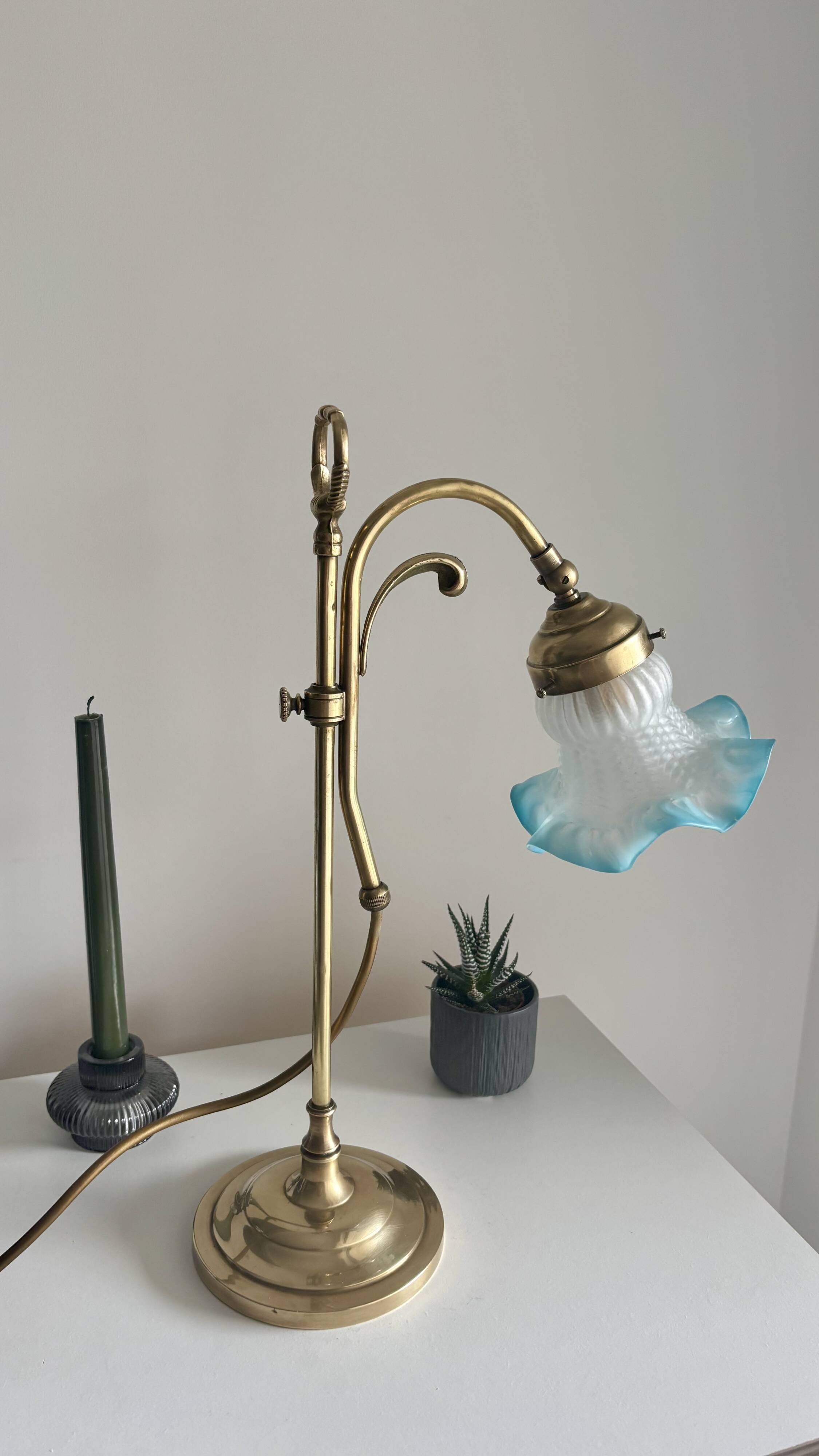 Art Nouveau style gilded brass lamp with sky blue opaline tulip